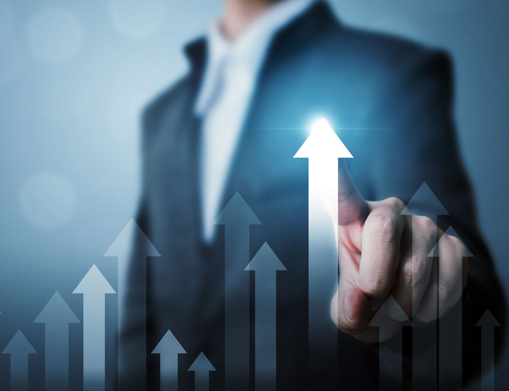 Businessman pointing arrow
